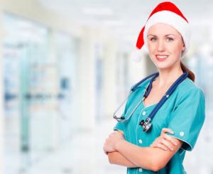 Doctor Wearing Holiday Santa Hat