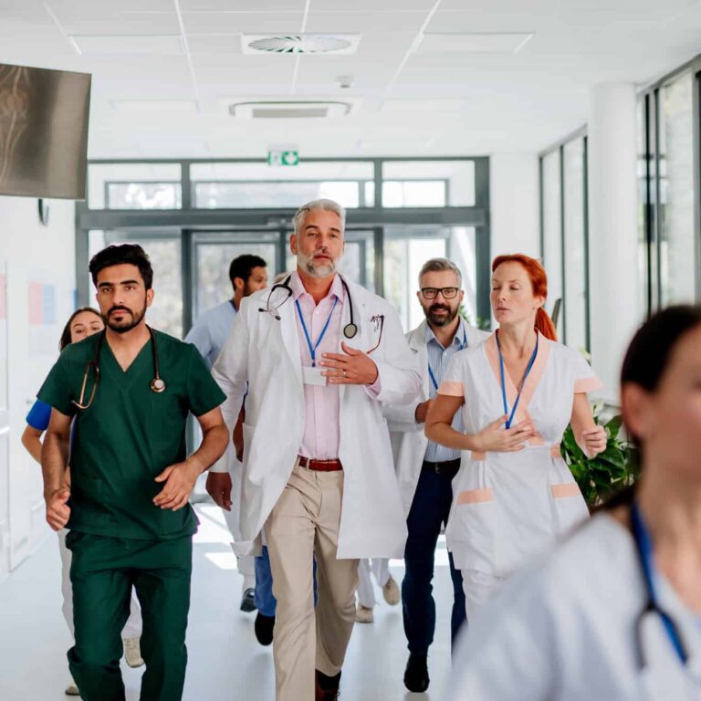 young-stressed-doctors-running-at-hospital-corrido-2024-10-18-16-57-54-utc (1)