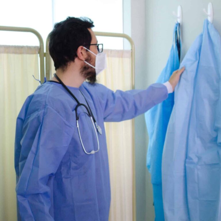 doctor-preparing-in-hospital-with-blue-scrubs-2026-01-07-07-14-36-utc (1)