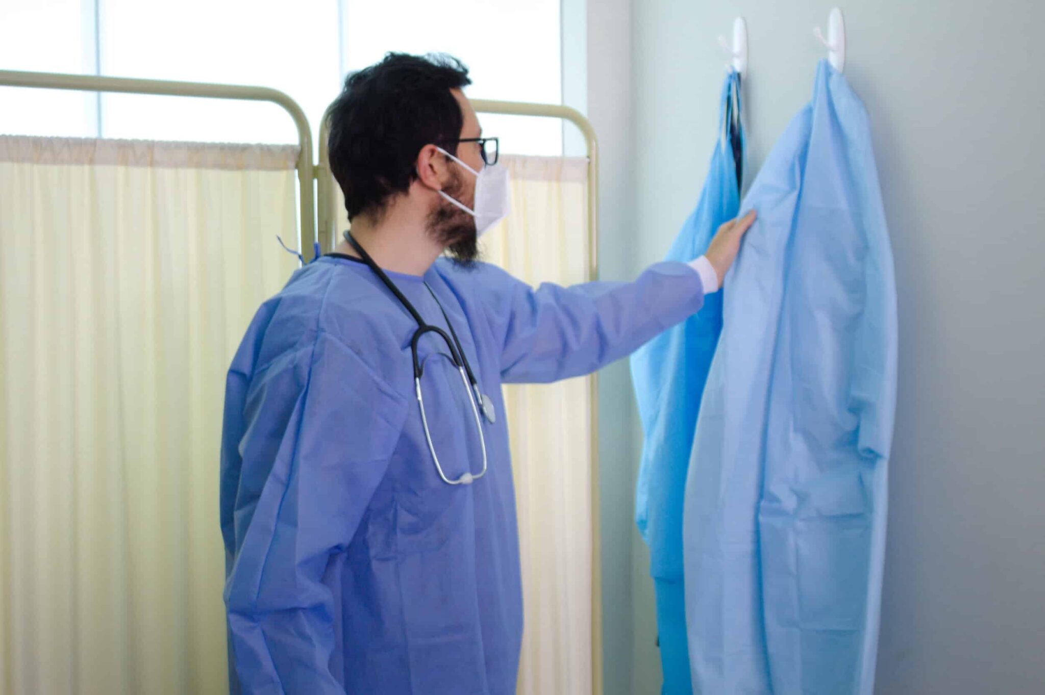 doctor-preparing-in-hospital-with-blue-scrubs-2026-01-07-07-14-36-utc (1)